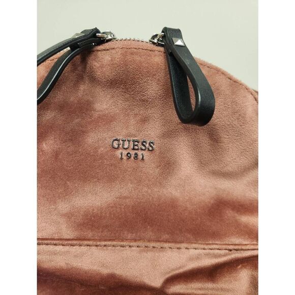 Guess small velvet feel pink backpack with black straps and pom. Measures approx main image 11